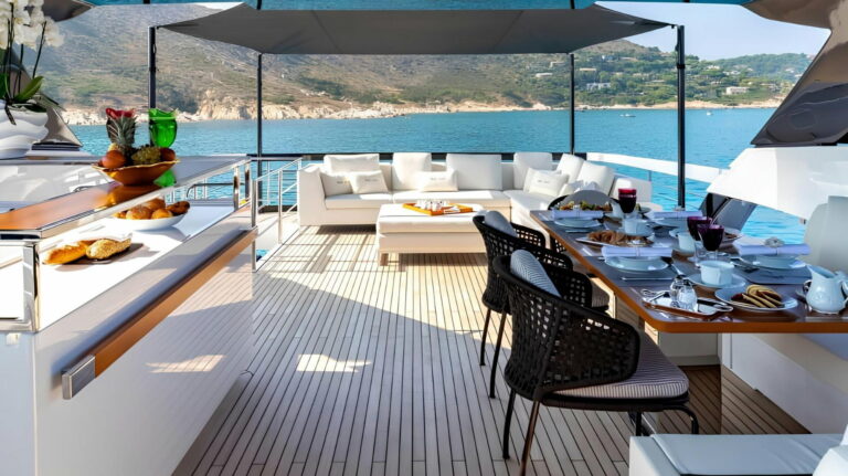 RAPH SEVEN II — shaded flybridge lounge and dining, charter Cote d Azur