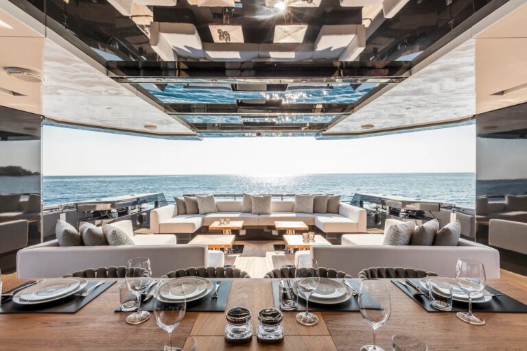 SEA CORAL II — alfresco dining table set for guests, charter Cote d Azur