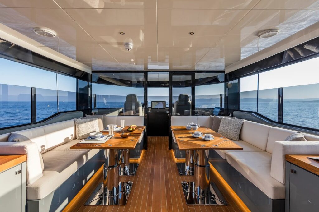 SEA CORAL II — indoor dining table with sea views, charter Cote d Azur