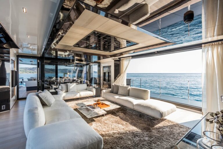 SEA CORAL II — main salon with floor-to-ceiling windows, charter Cote d Azur