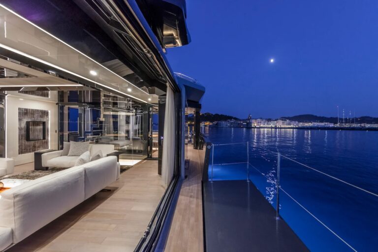 SEA CORAL II — salon at dusk with terrace open, charter Cote d Azur