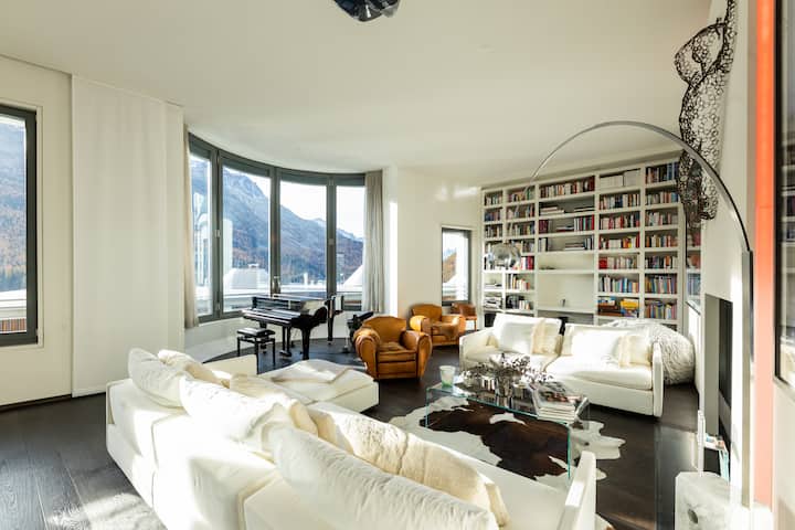 Angelus — grand piano living room with St Moritz mountain views