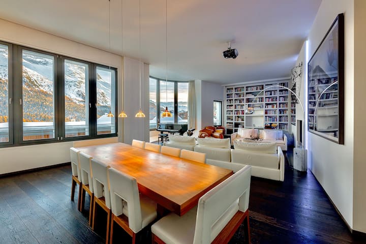 Angelus — dining table for ten with mountain views at dusk