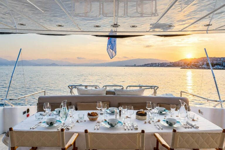 RAMSES II — main aft deck dining at sunset, charter Côte d'Azur